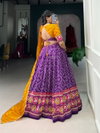 Purple Colour Tussar Silk Bandhej And Patola Print With Foil Work Lehenga With Blouse Dupatta Wholesale Online